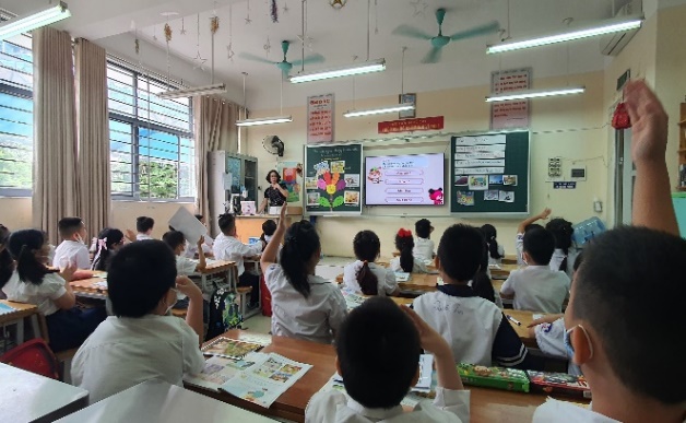 A picture containing text, person, indoor, ceiling
Description automatically generated