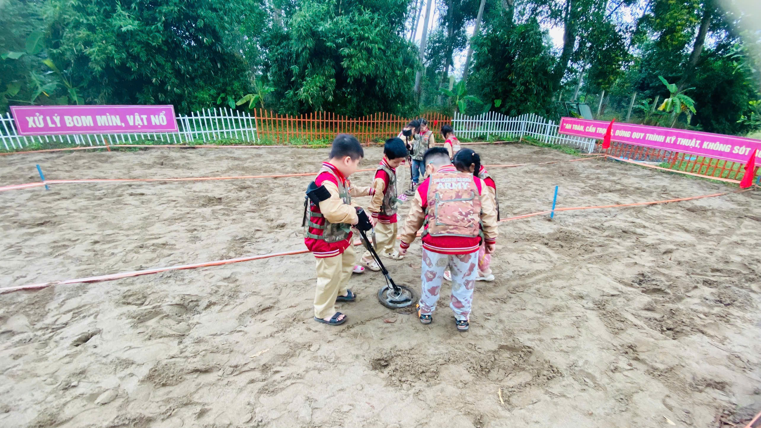 A group of kids playing in the sand

AI-generated content may be incorrect.