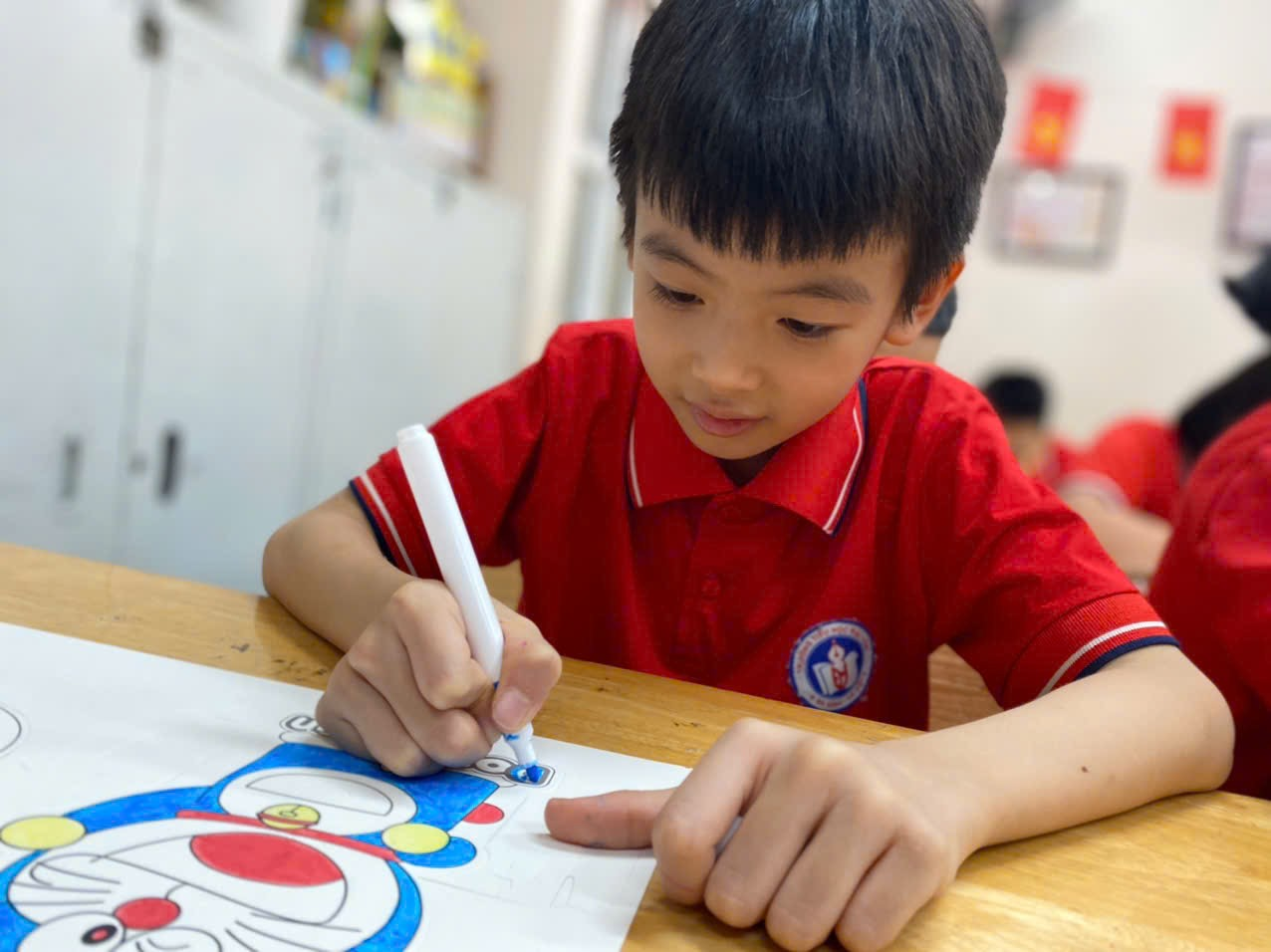 A child drawing on a piece of paper

AI-generated content may be incorrect.