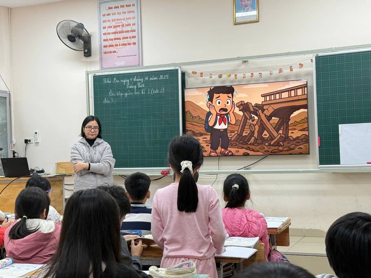 A person standing in front of a classroom with a group of children
AI-generated content may be incorrect.