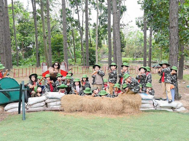 A group of children in military uniforms

AI-generated content may be incorrect.