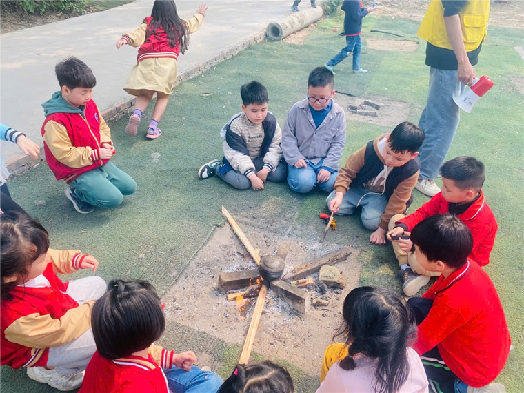 A group of children sitting around a fire

AI-generated content may be incorrect.