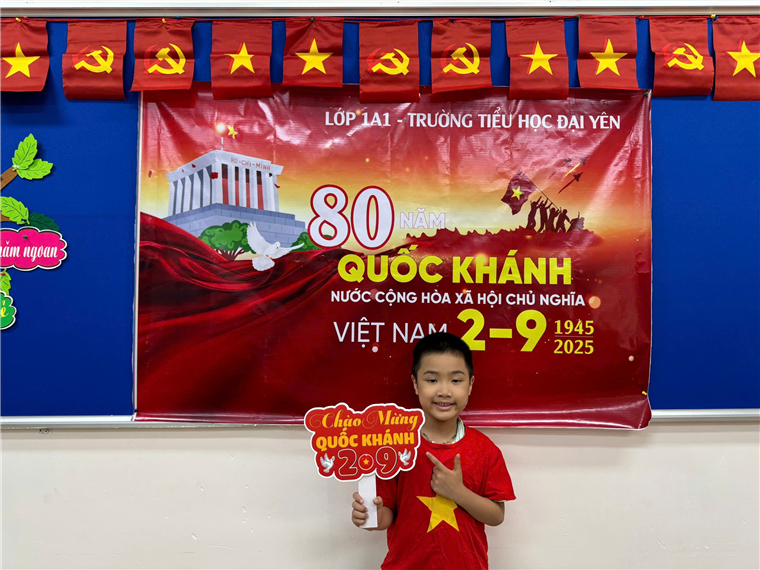 A child standing in front of a banner
AI-generated content may be incorrect.