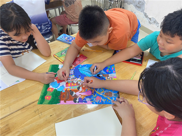 A group of children sitting around a table
AI-generated content may be incorrect.