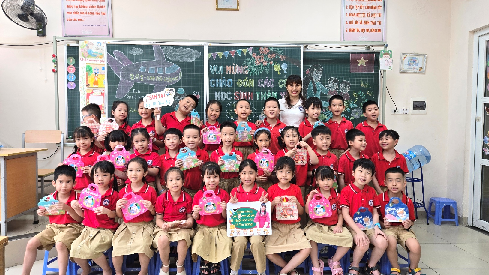 A group of children in red shirts

AI-generated content may be incorrect.