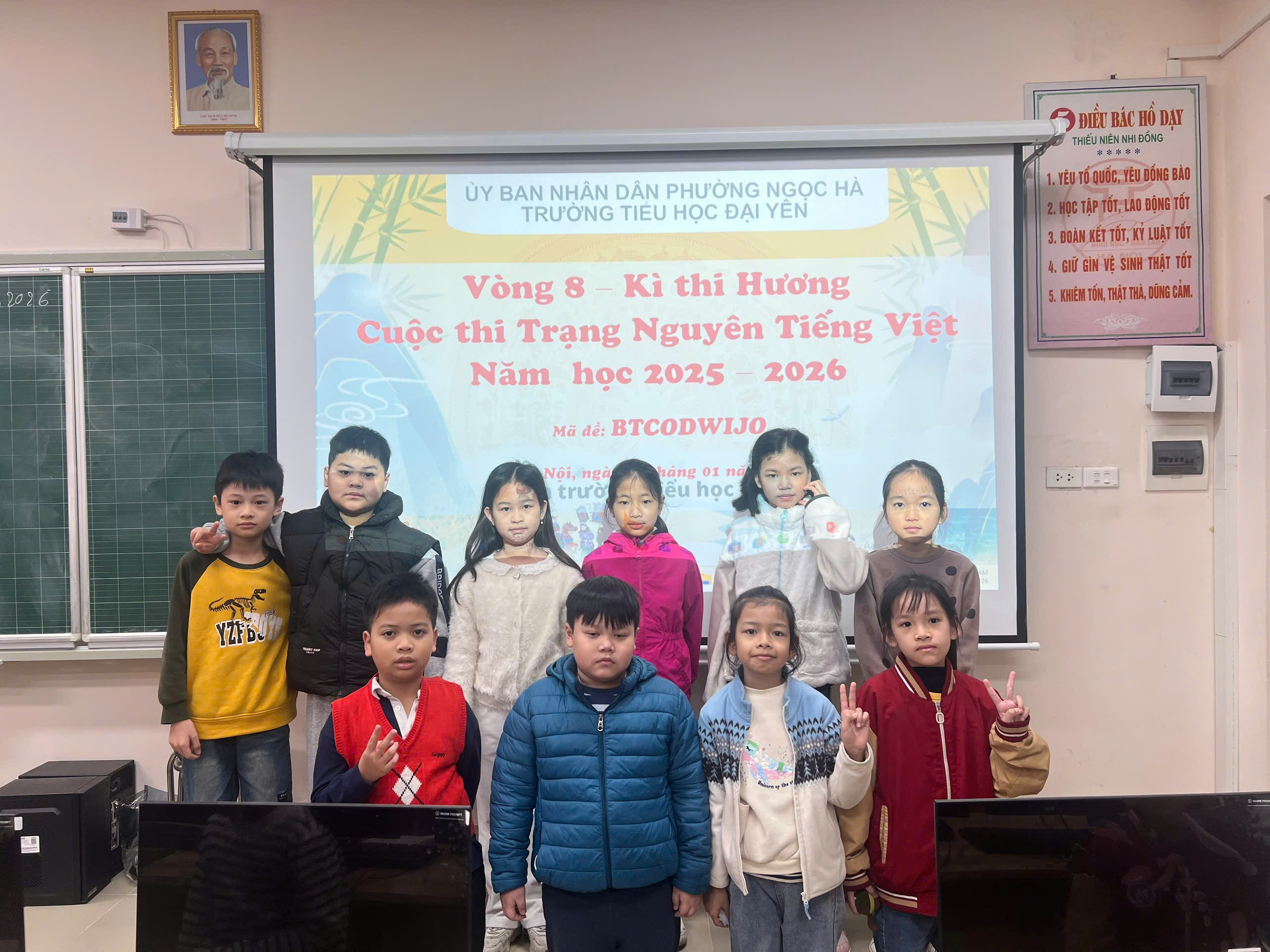 A group of children standing in front of a screen

AI-generated content may be incorrect.