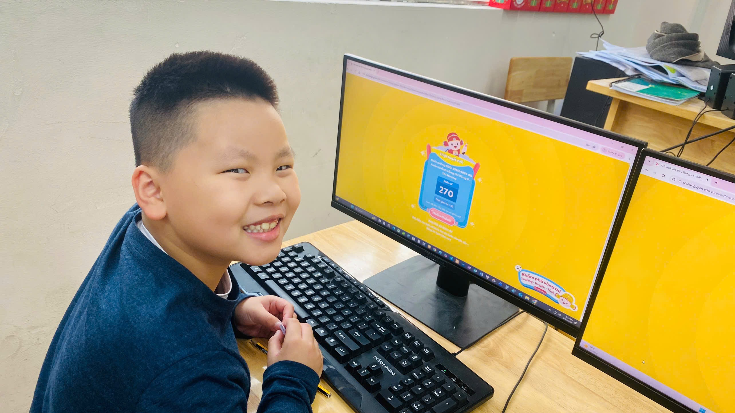 A child smiling at a computer screen

AI-generated content may be incorrect.
