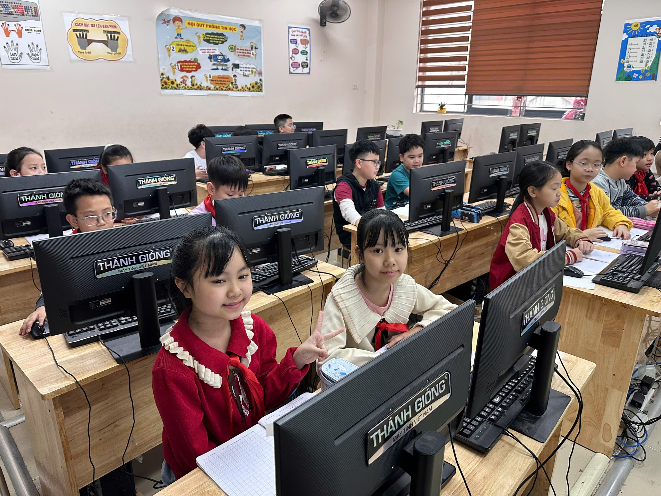 A group of children in a classroom using computers

AI-generated content may be incorrect.