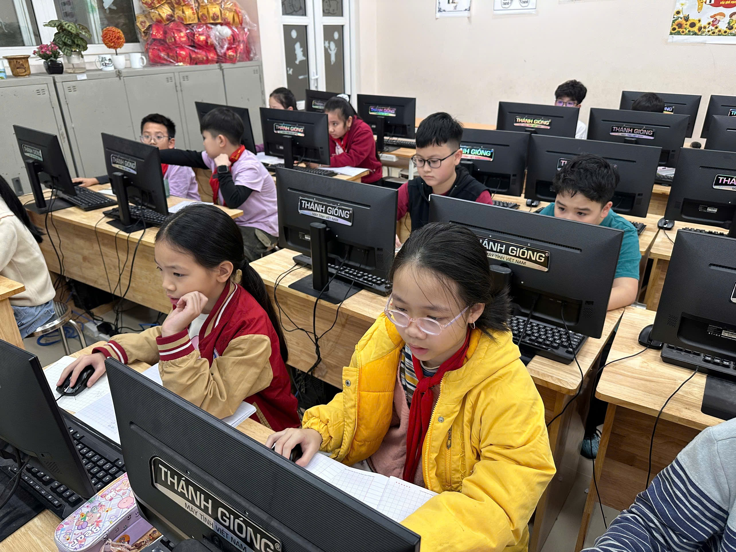 A group of children in a classroom using computers

AI-generated content may be incorrect.